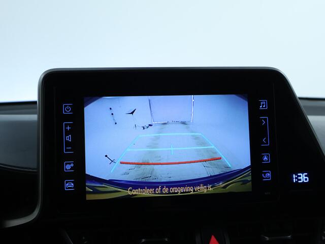 Toyota C-HR 1.8 Hybrid Style Limited | Adaptieve cruise control | Navigatie | Dodehoek waarschuwing | Bi-Tone | Stoelverwarming |