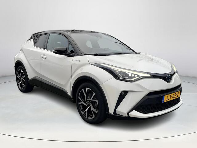 Toyota C-HR 1.8 Hybrid Bi-Tone | Carplay | Dode hoek waarschuwing | Stoelverwarming | Keyless entry |