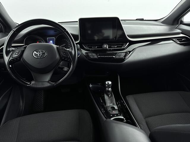 Toyota C-HR 1.8 Hybrid Dynamic Limited | Metaallak | Stoelverwarming | Parkeercamera | LM-Velgen | Donker Getinte Achterruiten |