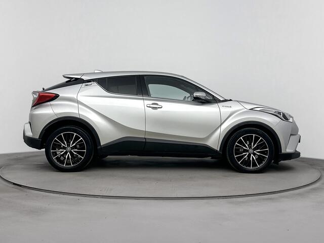 Toyota C-HR 1.8 Hybrid Dynamic Limited | Metaallak | Stoelverwarming | Parkeercamera | LM-Velgen | Donker Getinte Achterruiten |