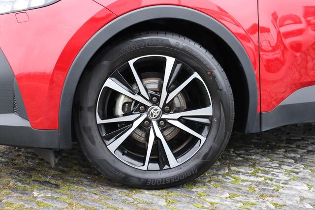 Toyota C-HR 1.8 Hybrid 140 First Edition Bitone, Apple carplay , Elek bediende achterklep, Parkeersensoren, BSM, Lendesteun,Stoel / stuur verwarming.