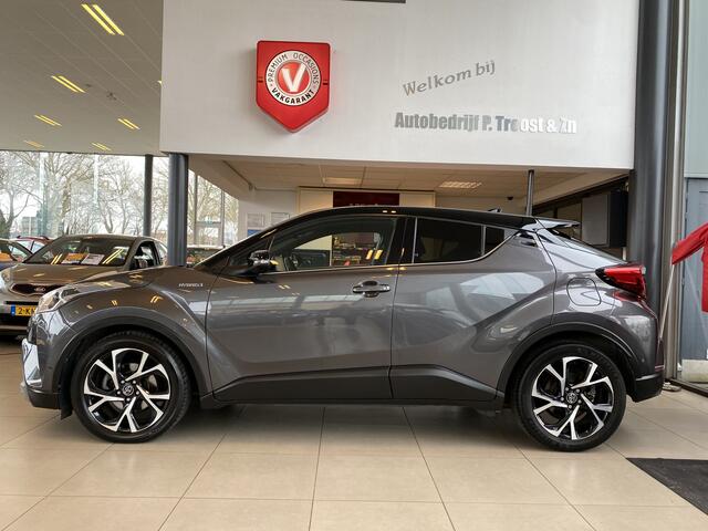 Toyota C-HR 1.8 Hybrid Bi-Tone,Automaat,Navigatie,Achteruitrijcamera,Climate&Cruisecontrol Adaptief,Trekhaak,Spraakbediening,Keyless,Stoelverwarming,V&A Sensoren,DAB,Dealer Onderhouden,18 Inch Lmv