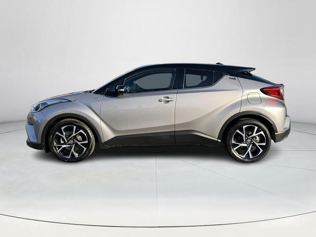 Toyota C-HR 1.8 Hybrid Bi-Tone | 1e eigenaar | Dealeronderhouden | Navigatie | 18 inch LM-velgen |