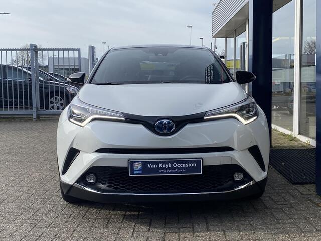 Toyota C-HR 1.8 Hybrid Bi-Tone / Automaat / Adaptieve Cruise-Control / Stoelverwarming / JBL-Audio / Dodehoek-Detectie / Afneembare-Trekhaak / Keyless / Climate-Control / Radio-Bluetooth / Navi / Camera / PDC V+A / 18'' LMV / All-Season / ENZ.