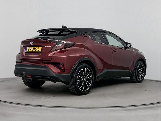Toyota C-HR 1.8 Hybrid Style Bi-Tone Limited | Trekhaak | Stoelverwarming | Navigatie | Blind Spot |