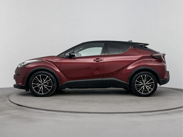 Toyota C-HR 1.8 Hybrid Style Bi-Tone Limited | Trekhaak | Stoelverwarming | Navigatie | Blind Spot |