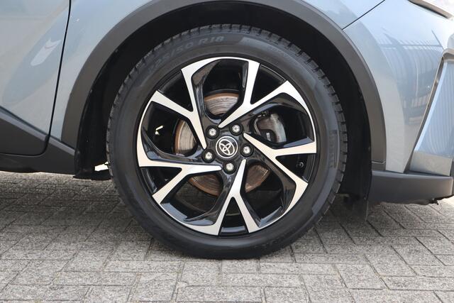 Toyota C-HR 1.8 Hybrid Business Plus Stoelverwarming/Achteruitrijcamera/JBL Audio/Navigatie/DAB/Bluetooth/Climate control/18 inch Licht metaal 2E PINKSTERDAG GEOPEND VAN 12:00 TOT 17:00 (ROTTERDAM&HELLEVOETSLUIS)