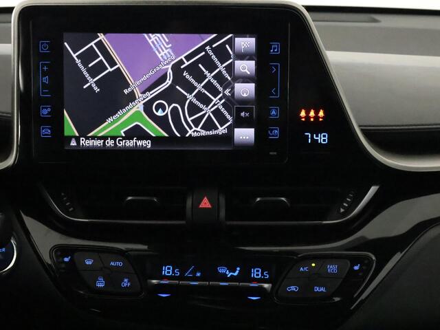 Toyota C-HR 1.8 Hybrid Executive Limited Bi-Tone | Navigatie | Stoelverwarming | Dodehoek Detectie | Camera |