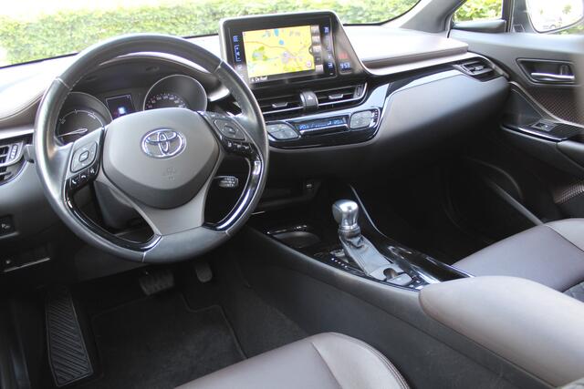 Toyota C-HR 1.8 Hybrid Executive | Rijklaar | Parelmoer | Stoelverw. | Navi | PDC | Camera | Bluetooth | Clima | Adap.Cruise