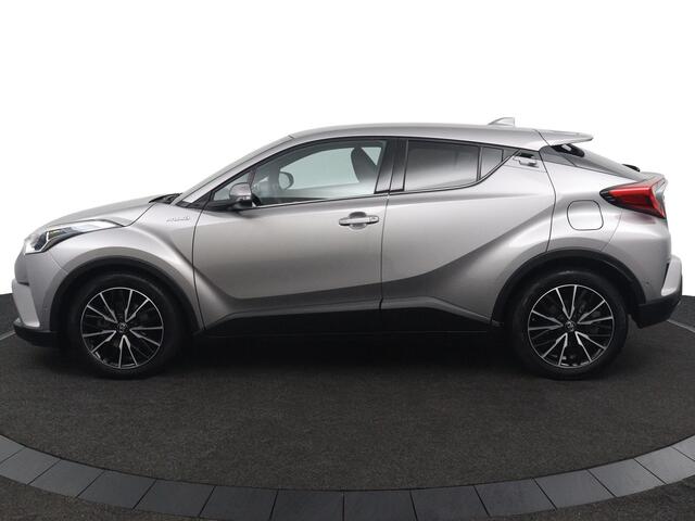 Toyota C-HR 1.8 Hybrid Executive | Kunst Lederen Bekleding | Keyless Entry | Parkeersensoren en Camera | Navigatie | Licht en regensensor |
