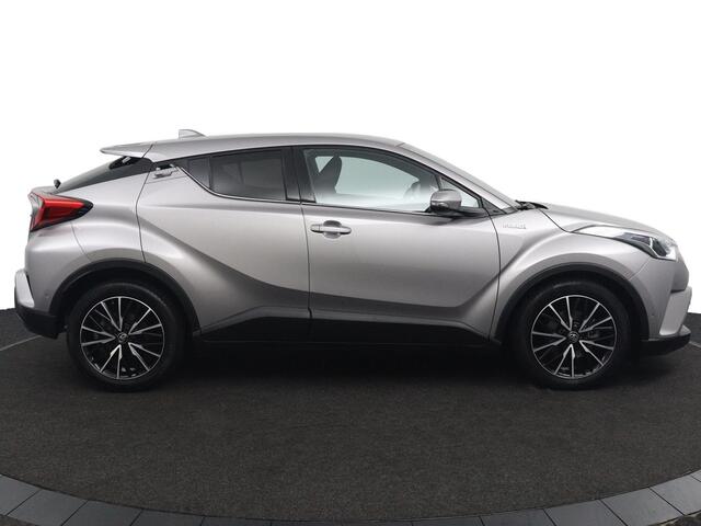 Toyota C-HR 1.8 Hybrid Executive | Kunst Lederen Bekleding | Keyless Entry | Parkeersensoren en Camera | Navigatie | Licht en regensensor |