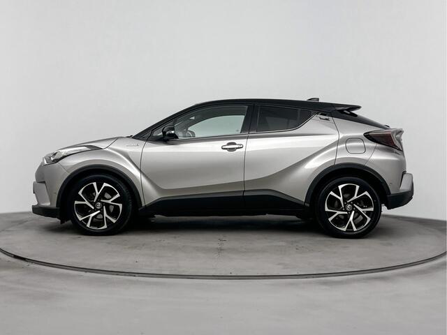 Toyota C-HR 1.8 Hybrid Bi-Tone Plus | Parkeersensoren V+A | JBL | Stuur-Stoelverwarming |