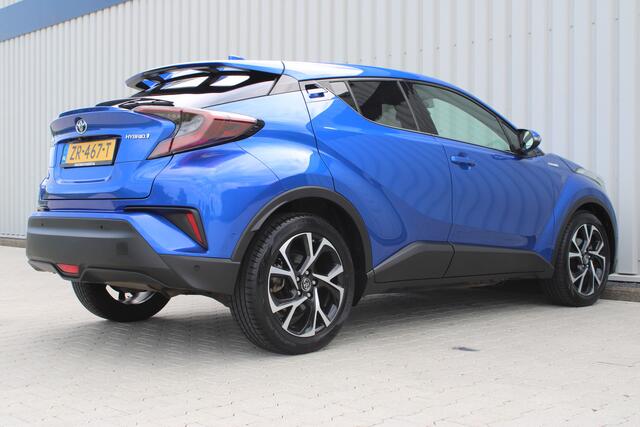 Toyota C-HR 1.8 Hybrid Style Ultimate | Incl. 12 maanden garantie | JBL audio | Adaptieve cruise control | Climate control | DAB radio | Parkeercamera | Navigatie | Stoelverwarming |