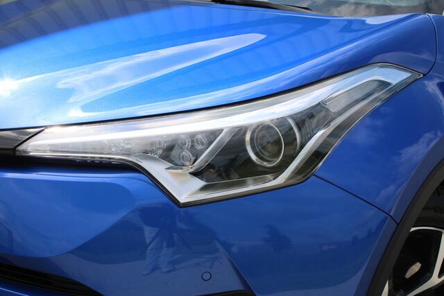 Toyota C-HR 1.8 Hybrid Style Ultimate | Incl. 12 maanden garantie | JBL audio | Adaptieve cruise control | Climate control | DAB radio | Parkeercamera | Navigatie | Stoelverwarming |