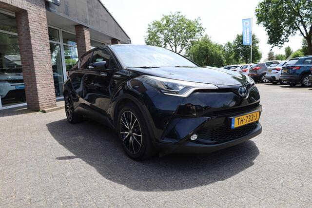 Toyota C-HR 1.8 Hybrid Bi-Tone TREKHAAK LEER STOEL/STUURVERW. CAMERA NAVI ACC CLIMA PDC 18''LMV NAP DEALERONDH.