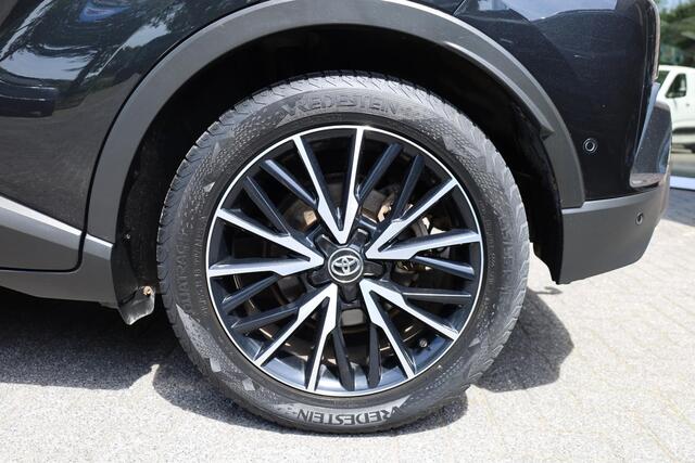 Toyota C-HR 1.8 Hybrid Bi-Tone TREKHAAK LEER STOEL/STUURVERW. CAMERA NAVI ACC CLIMA PDC 18''LMV NAP DEALERONDH.