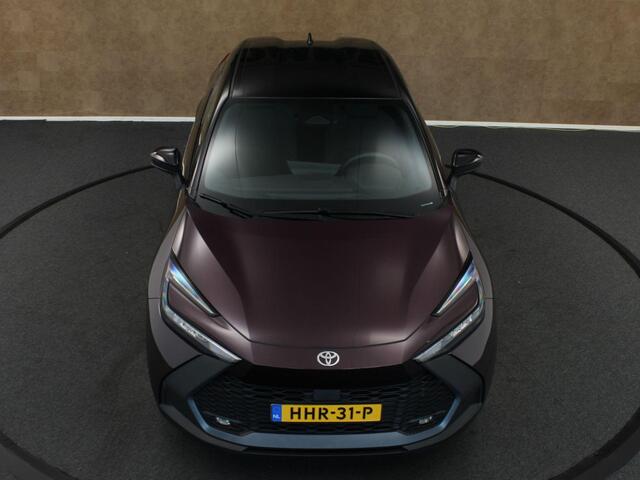 Toyota C-HR 2.0 Hybrid 200 Dynamic - BI-TONE - PARKEERSENSOREN VOOR EN ACHTER - DODEHOEK DETECTIE - KEYLESS ENRTY & SSTART - STOEL & STUUR VERWARMING - NAVIGATIE - APPLE CARPLAY/ANDROID AUTO - DRAADLOZE TELEFOONLADER