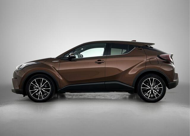 Toyota C-HR 1.8 Hybrid Premium | Dealer onderhouden | JBL | Lederen bekleding | FULL LED verlichting | Stoelverwarming | Parkeersensoren voor+achter met Assistent | Navigatie | Climate Control | Cruise Control Adaptive |