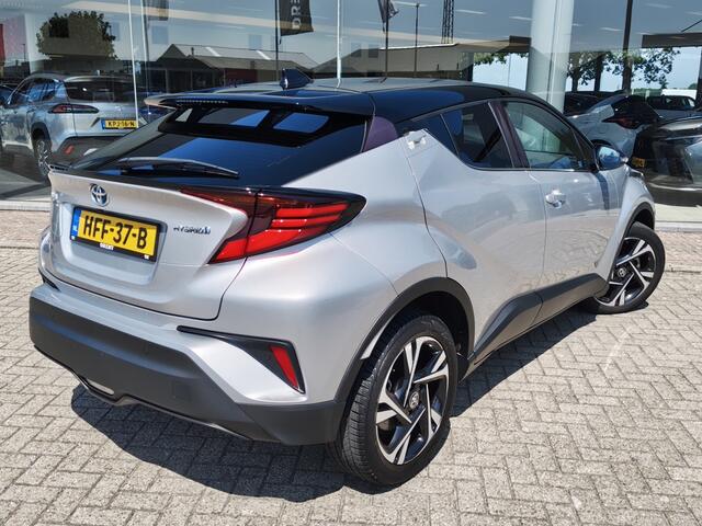 Toyota C-HR 1.8 Hybrid Style Bi-Tone | Premium Pack | Sensoren v/a | Android