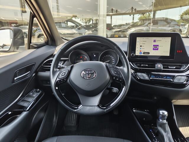 Toyota C-HR 1.8 Hybrid Style Bi-Tone | Premium Pack | Sensoren v/a | Android