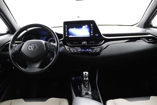 Toyota C-HR 1.8 Hybrid Bi-Tone | Stuur en stoelverwarming | Dodehoek herkenning | Lederen bekleding |