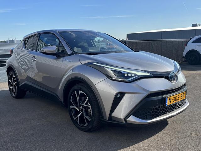 Toyota C-HR 1.8 Hybrid Style Trekhaak, Navigatie, Dodehoekdetectie, Stoelverwarming, LMV, Parkeersensoren voor + achter, Smart Key, Nieuw geleverd en dealeronderhouden