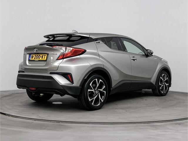 Toyota C-HR 1.8 Hybrid Style Limited | Lichtmetalen Velgen 18'' | Parkeersensoren V+A | Stoelverwarming | Navi |