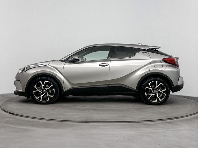 Toyota C-HR 1.8 Hybrid Style Limited | Lichtmetalen Velgen 18'' | Parkeersensoren V+A | Stoelverwarming | Navi |