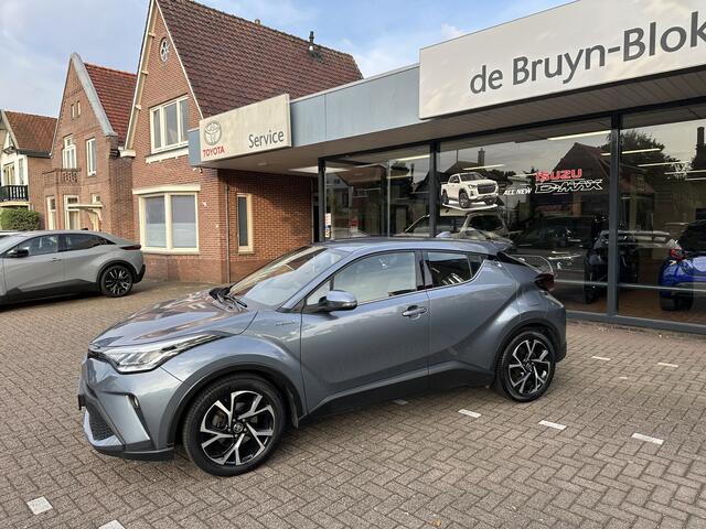 Toyota C-HR 2.0 Hybrid Dynamic parkeercamera, climate- en cruise control, afneembare trekhaak, origineel Nederlandse auto, 2e eigenaar, dealeronderhouden, parkeersensoren voor en achter, Apple Carplay, Android Auto, Toyota 10 jaar garantie programma, Toyota pechhulp