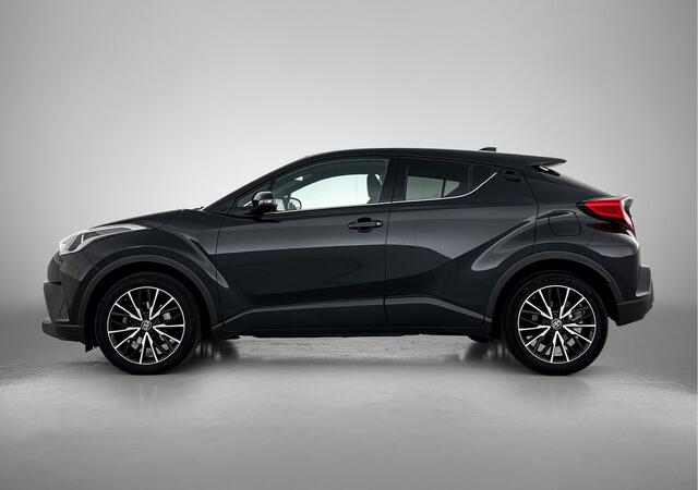 Toyota C-HR 1.2 Executive | Trekhaak - 1300KG trekgewicht! | Half Lederen bekleding | Stoelverwarming | Navigatie | Parkeersensoren voor+achter | Achteruitrijcamera | Climate Control |