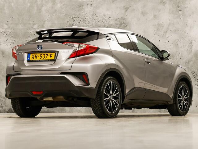 Toyota C-HR 1.8 Hybrid Sport Automaat (NAVIGATIE, CAMERA, STUUR/STOELVERWARMING, GETINT GLAS, SPORTSTOELEN, ADAPTIVE CRUISE, KEYLESS, NIEUWSTAAT)