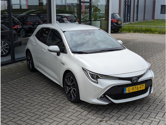 Toyota COROLLA 2.0 Hybrid Executive JBL | Stoelverwarming | Leer | HUD | Parkeersensoren V+A | Dodehoek | Adap. Cruise