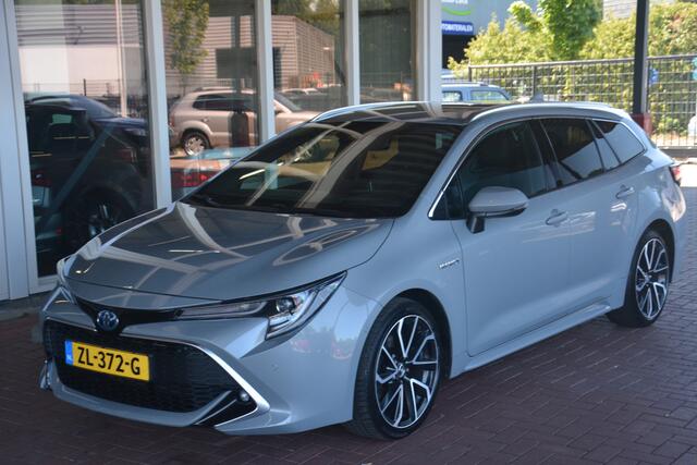 Toyota COROLLA Touring Sports 2.0 Hybrid Executive 1e eigenaar Nederlandse auto 108593 NAP dealeronderhouden laatste beurt bij 97000 km met oa ecc navigatie DAB camera afneembare trekhaak Head Up display lane assist dode hoek sensor adaptive