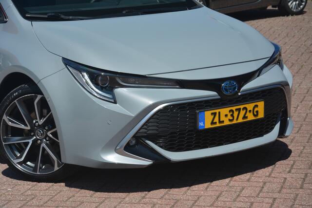Toyota COROLLA Touring Sports 2.0 Hybrid Executive 1e eigenaar Nederlandse auto 108593 NAP dealeronderhouden laatste beurt bij 97000 km met oa ecc navigatie DAB camera afneembare trekhaak Head Up display lane assist dode hoek sensor adaptive