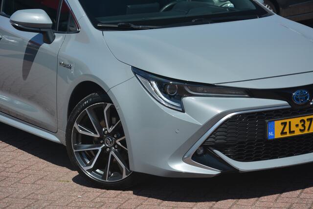 Toyota COROLLA Touring Sports 2.0 Hybrid Executive 1e eigenaar Nederlandse auto 108593 NAP dealeronderhouden laatste beurt bij 97000 km met oa ecc navigatie DAB camera afneembare trekhaak Head Up display lane assist dode hoek sensor adaptive