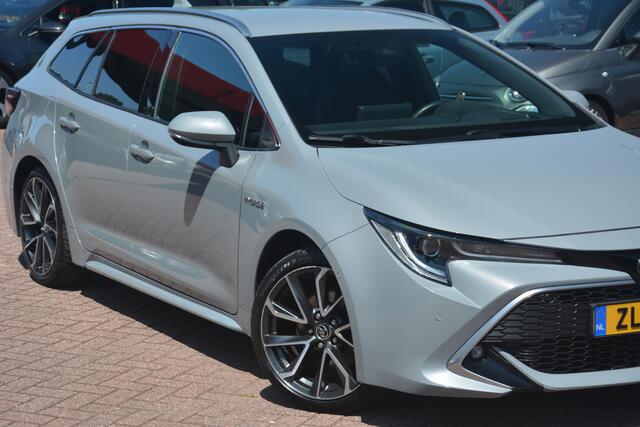 Toyota COROLLA Touring Sports 2.0 Hybrid Executive 1e eigenaar Nederlandse auto 108593 NAP dealeronderhouden laatste beurt bij 97000 km met oa ecc navigatie DAB camera afneembare trekhaak Head Up display lane assist dode hoek sensor adaptive