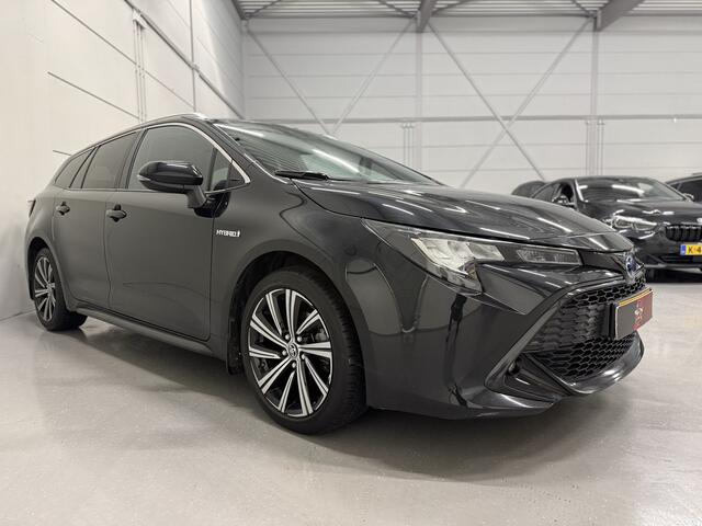 Toyota COROLLA Touring Sports 1.8 Hybrid Business Plus LED/TREKHAAK/VIRTUAL/SPORTSTOELEN H.LEER/ACC/CAMERA/CARPLAY/KEYLESS/17"/PRIVACY/STOELVERWARMING/ORIG. NL AUTO/PURE BLACK METALLIC