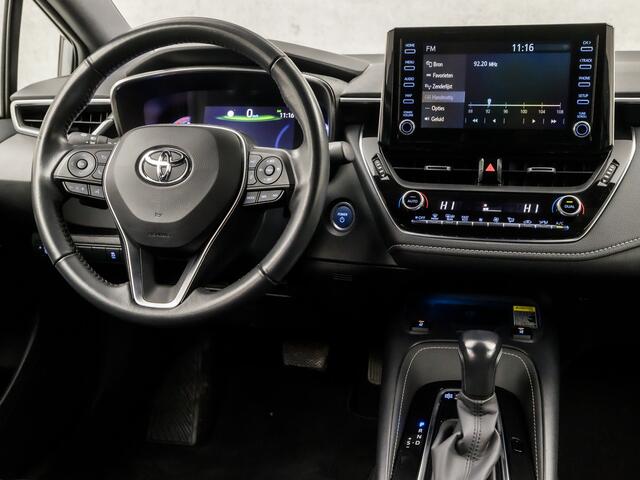 Toyota COROLLA Touring Sports 2.0 Hybrid Sport 180Pk Automaat (APPLE CARPLAY, NAVIGATIE, CAMERA, LEDER, STOELVERWARMING, SPORTSTOELEN, ADAPTIVE CRUISE, KEYLESS, GETINT GLAS, NIEUWE APK, NIEUWSTAAT)