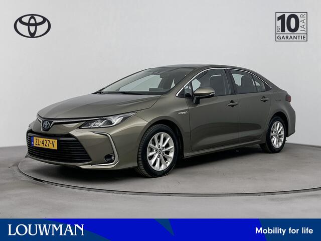 Toyota COROLLA 1.8 Hybrid Active Navi | 16'' Lichtmetalen velgen | Metaalkleur | Parkeercamera | NL-Auto |
