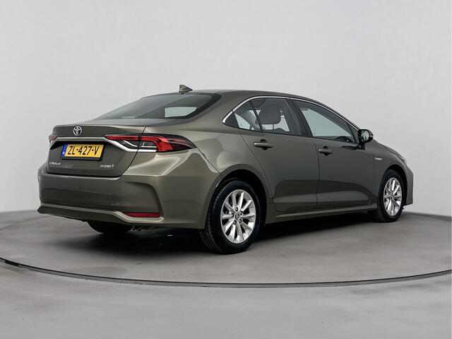 Toyota COROLLA 1.8 Hybrid Active Navi | 16'' Lichtmetalen velgen | Metaalkleur | Parkeercamera | NL-Auto |