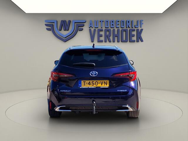 Toyota COROLLA Touring Sports Hybrid 140 First Edition Trekhaak - NL Auto - Leer
