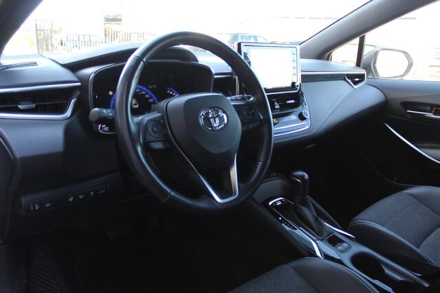 Toyota COROLLA Touring Sports 1.8 Hybrid Dynamic Bi-Tone | Rijklaar | HUD | Trekhaak | Stoel/Stuur-verw. | Camera | Apple/Android | Clima | Adap. Cruise