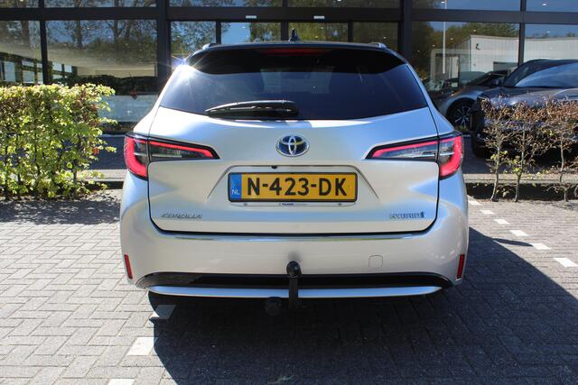 Toyota COROLLA Touring Sports 1.8 Hybrid Dynamic Bi-Tone | Rijklaar | HUD | Trekhaak | Stoel/Stuur-verw. | Camera | Apple/Android | Clima | Adap. Cruise