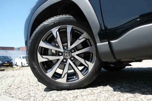 Toyota COROLLA Cross Hybrid 140 Style Automaat | Premium Pack | Stoelverwarming voorstoelen | Stuurwielverwarming | Stoelbekleding van luxe stof antraciet met zwarte kunstlederen accenten | Parkeer- & manoeuvreerhulp d.