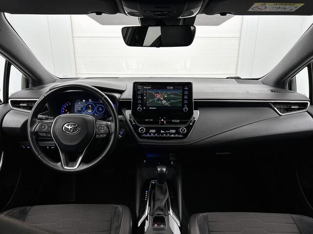 Toyota COROLLA Touring Sports 1.8 Hybrid Executive Bi-Tone | Dealer onderhouden | Head-Up display | Dodehoek detectie | Parkeersensoren voor+achter met assistent | elektrische achterklep | Stoelverwarming | Draadloze telefoonlader |