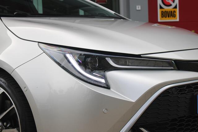 Toyota COROLLA Touring Sports 2.0 Hybrid 180PK AUTOMAAT EXECUTIVE JBL | STOEL VERWARMING | DODEHOEK DETECTIE | NAVIGATIE | APPLE CARPLAY/ANDROID AUTO | CLIMATE CONTROL | ADAPTIVE CRUISE CONTROL | FULL LED KOPLAMPEN | KEYLESS ENTRY/START | ALL SEASON BANDEN | 18" LICHTMETALEN VELGEN | DAB+ RADIO | JBL AUDIO SSTEM | ELEKTRISCH BEDIENBARE ACHTERKLEP | ACHTERUITRIJ CAMERA | PARKEERSENSOREN VOOR + ACHTER | DRAADLOZE TELEFOONLADER | HEAD UP DISPLAY |
