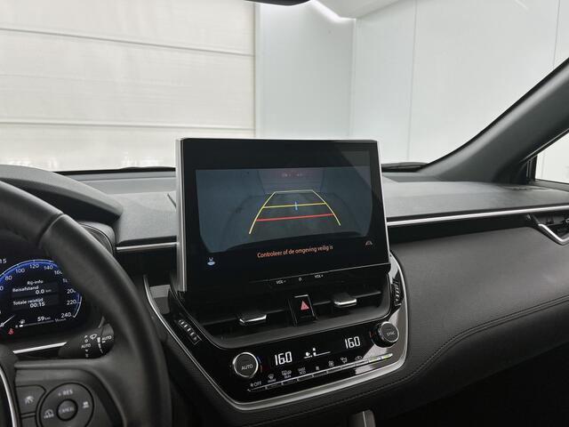 Toyota COROLLA Cross 2.0 High Power Hybrid First Edition | Stoelverwarming | Dealeronderhoud | Half Leder / Stof |