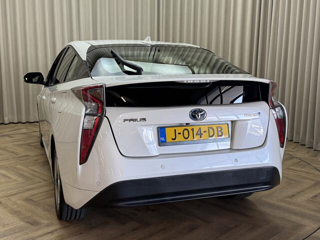 Toyota PRIUS 1.8 White Edition Adaptive Cruise / HUD / Keyless / Stoelverwarming / JBL / Camera / Navigatie / 17'' LMV