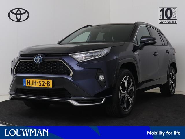 Toyota RAV4 2.5 Plug-in Hybrid AWD Bi-Tone Plus Limited I JBL | Trekhaak afneembaar I Navigatie I Climate Control I Cruise Control I 360 Camera I Voorruit-/Stuurverwarming | Stoelverwarming/-Verkoeling | Lederen bekleding I Subwoofer I Dodehoek Detectie |
