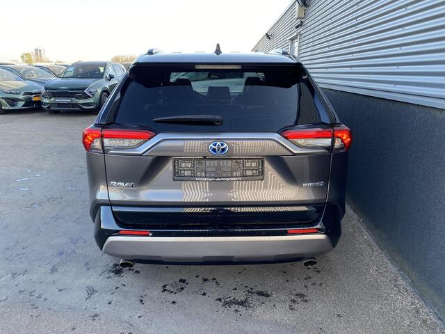 Toyota RAV4 2.5 Hybrid Bi-Tone | Zwart dak | Zwarte velgen | Lederen bekleding | Adaptive cruise control | Elektr. Bedienbare achterklep | Stoelverwarming | Elektr. inklapbare buitenspiegels | Achteruitrij camera |